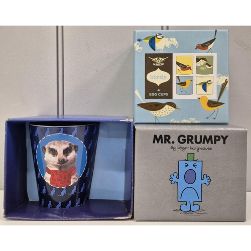 4830 - A collection of boxed, fun tableware. To include Mr Grumpy mug, Meerkat mug &  a set of four Magpie ... 