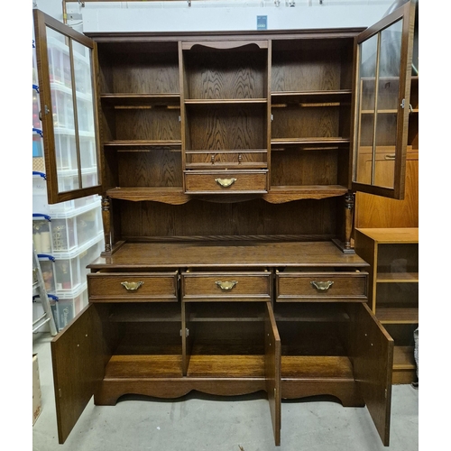 4891 - A vintage, walnut-coloured display dresser. Features three drawers (one cutlery divided) & an intern... 