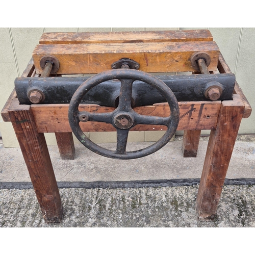 4964 - An early 1900's industrial book binding press, raised on bench legs, with lid/work area. Made by Ham... 