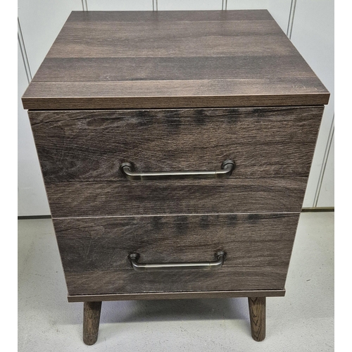 6310 - A contemporary, oak 2-drawer bedside table, with splayed legs. Dimensions(cm) H62, W43, D44.