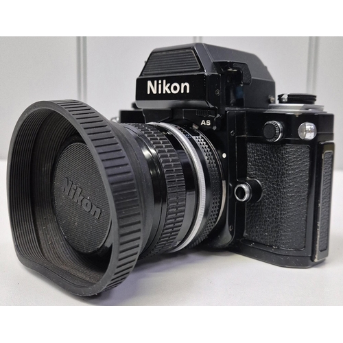 5975 - A professional Nikon F2 35mm SLR camera, with a huge range of accessories, to include six lenses, fl... 