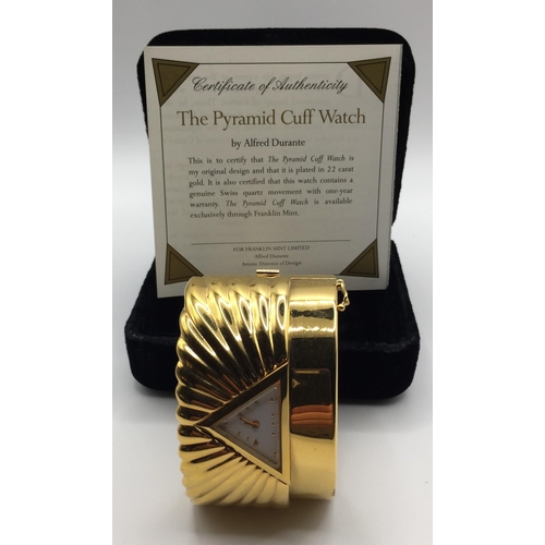 5984 - A 22ct gold-plated ladies cuff watch, by Alfred Durante for Franklin Mint. Late 1980's. Complete wit... 