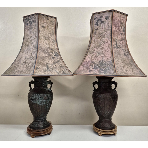 6301 - A pair of vintage, bronzed oriental table lamps, with stands. PAT test failure - rewire will be requ... 