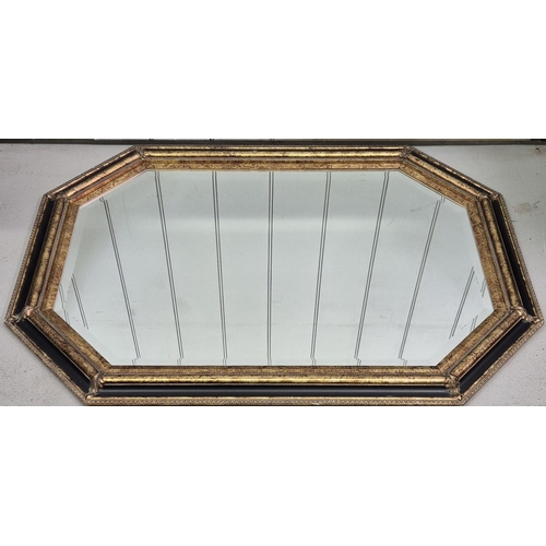 6306 - A Malaysian over mantle mirror, with triple octagonal frame & bevelled edged glass. Dimensions 78cm ... 