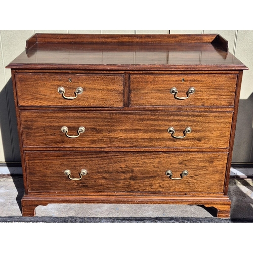 6329 - A Georgian-style mahogany chest of two over two drawers. Made by S & E Fairfield Co Ltd, Govan, Glas... 