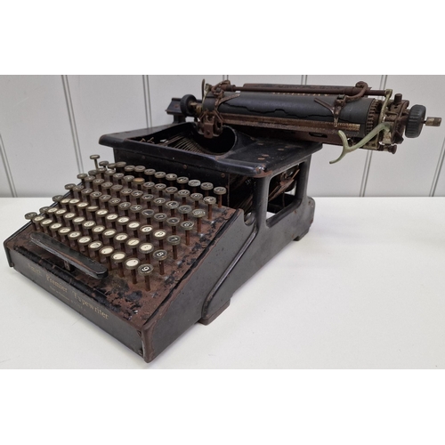 6357 - A c.1900 manual 'Smith Premier' typewriter. Made in USA & featuring double upper/lower case keys. Di... 