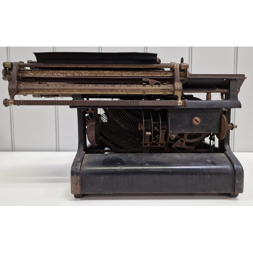 6357 - A c.1900 manual 'Smith Premier' typewriter. Made in USA & featuring double upper/lower case keys. Di... 