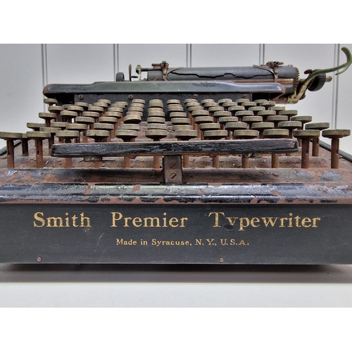 6357 - A c.1900 manual 'Smith Premier' typewriter. Made in USA & featuring double upper/lower case keys. Di... 