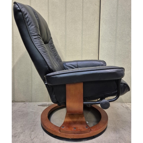 4 - A black leather, stressless armchair & matching footstool. Chair dimensions(cm) H95 (45 to seat), W7... 