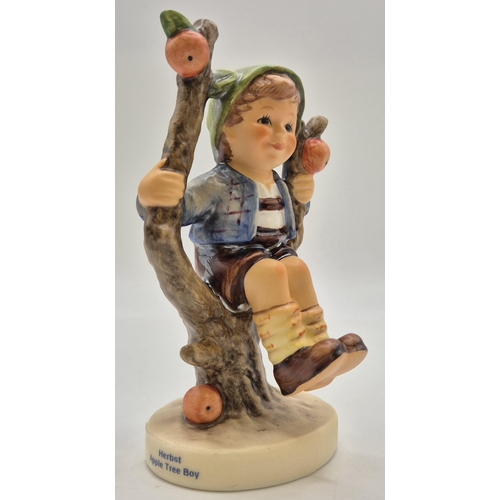 7 - A boxed Goebel 'Apple Tree Boy' figurine. Complete with certificate of authenticity. Height 11cm.