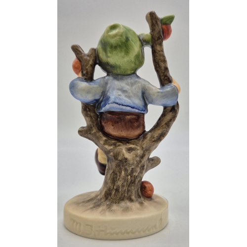 7 - A boxed Goebel 'Apple Tree Boy' figurine. Complete with certificate of authenticity. Height 11cm.