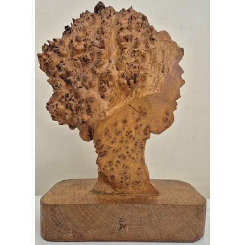 10 - A vintage carved 'Stickland Bear', by History Craft, together with a carved tree form. Respective di... 