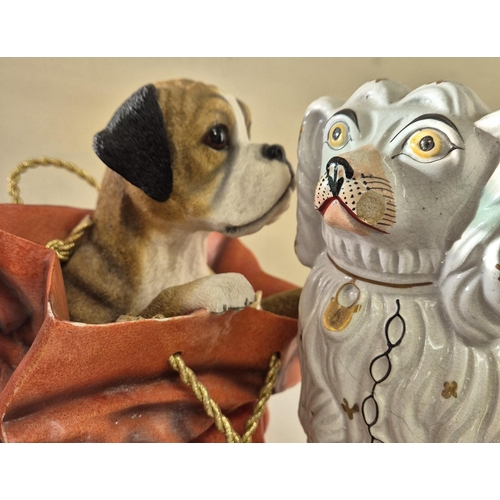 47 - A collection of six vintage decorative figures. To include mantel dogs, etc. Tallest 26cm