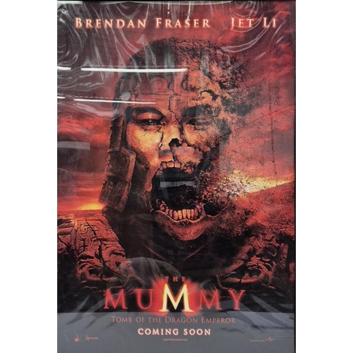 66 - Two framed movie posters.  To include The Mummy 3 - Tomb of the Dragon Emperor & Jarhead. Framed dim... 