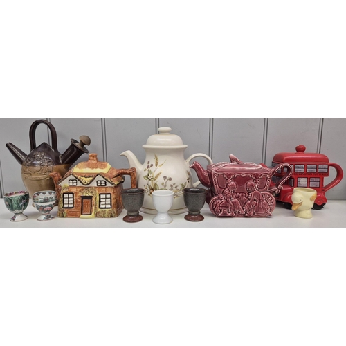 104 - A selection of vintage ceramic tableware. To include an Ellgreave Burslem Cinderella teapot, Kensing... 