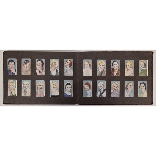 154 - A cigarette card album full of Gallaher Ltd & Godfrey Phillips Famous Faces/Scenes From Films sets.