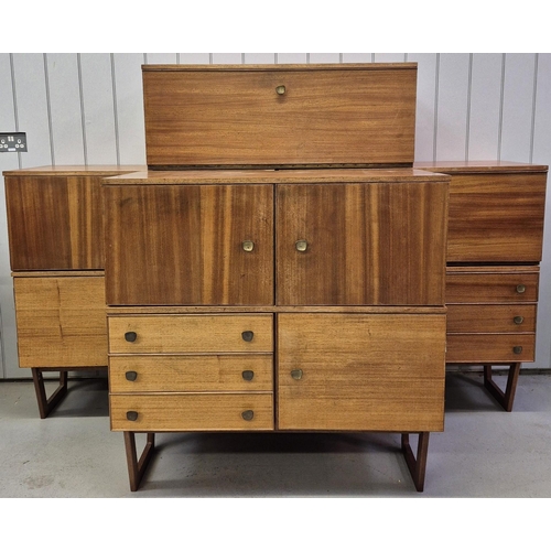 95 - A collection of seven pieces of mid-century teak modular furniture. To include three base pieces, wi... 