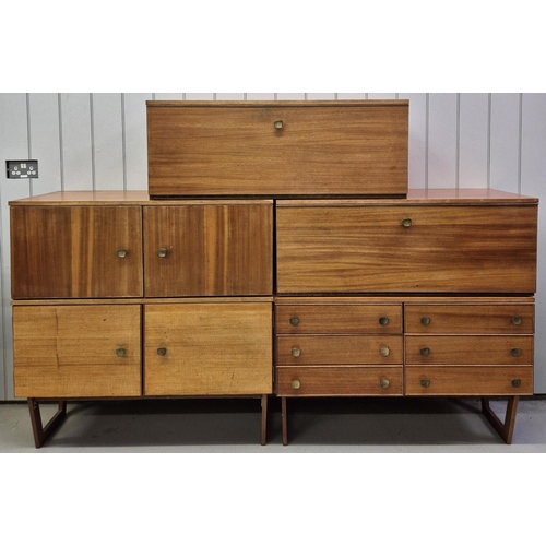 95 - A collection of seven pieces of mid-century teak modular furniture. To include three base pieces, wi... 