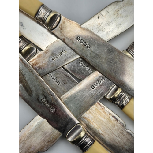 160 - A set of six fish knives & forks, each with silver collars & silver-plated blades.