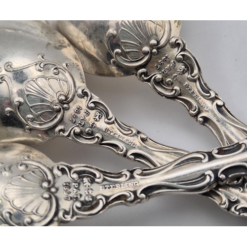 163 - A set of five Gorham silver spoons, marked 'PAT 1897', Birmingham assay. Weight approx. 144.1g.