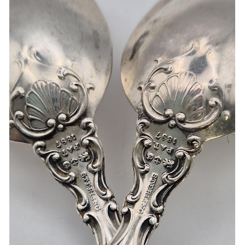 163 - A set of five Gorham silver spoons, marked 'PAT 1897', Birmingham assay. Weight approx. 144.1g.