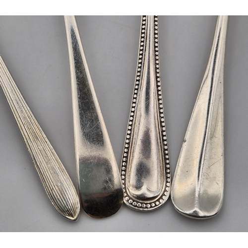 166 - A collection of four silver christening spoons. To include Birmingham 1929, by James Swann & Son; Sh... 