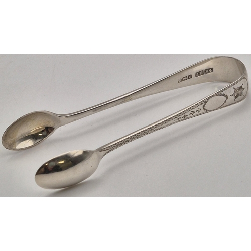 168 - A Georgian silver spoon by Stephen Adams, London 1807; together with Victorian silver sugar nips by ... 