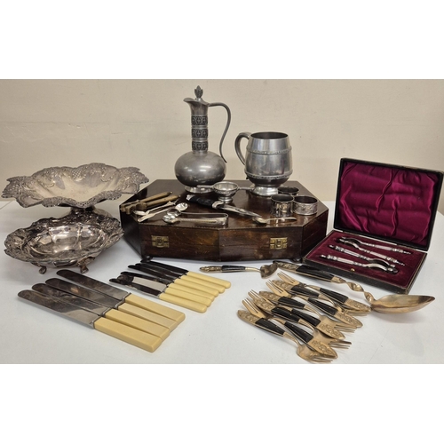 179 - A large collection of vintage metal tableware. To include a pair of presentation boxed nutcrackers, ... 