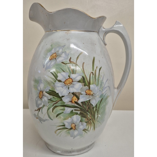 200 - A wash jug by Trade Brothers, Staffordshire, together with an unbranded wash bowl. Respective dimens... 