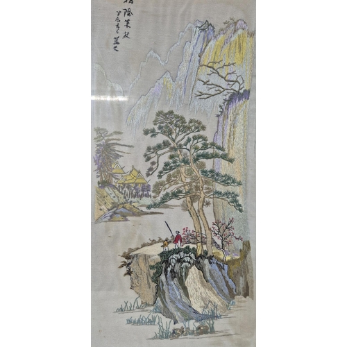 275 - A vintage, framed Japanese silk tapestry, depicting mountain scenes. Framed dimensions 68cm x 38cm.