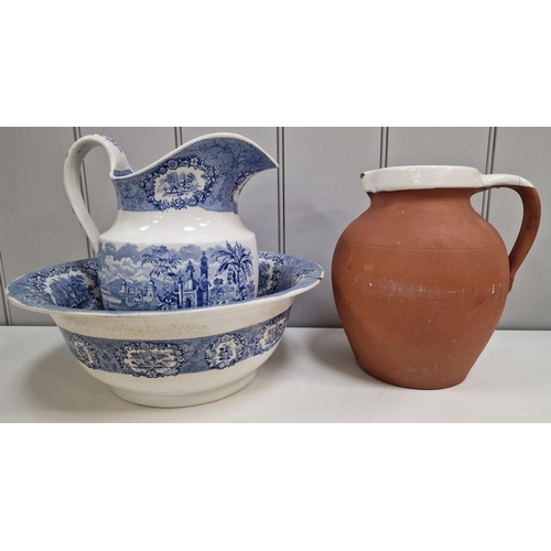 338 - A Royal Barum Ware large terracotta water jug, together with a vintage, two-piece imported wash set.