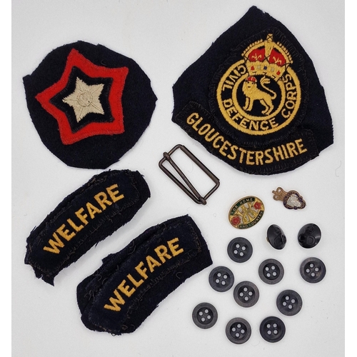 341 - A mixed selection of uniform tabs, buttons & badges.