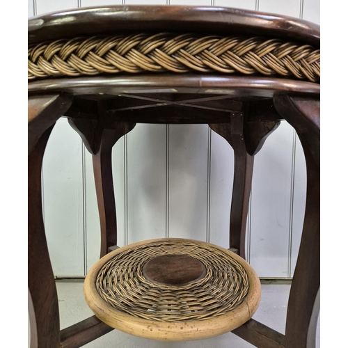 594 - A good quality mahogany occasional table, with woven cane border & undershelf. Dimensions(cm) H69, W... 