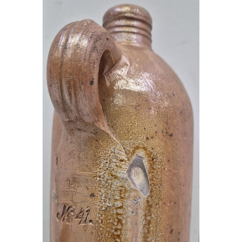 213 - Two antique salt glazed bottles. To include R Whites ginger beer bottle, together with a German wate... 