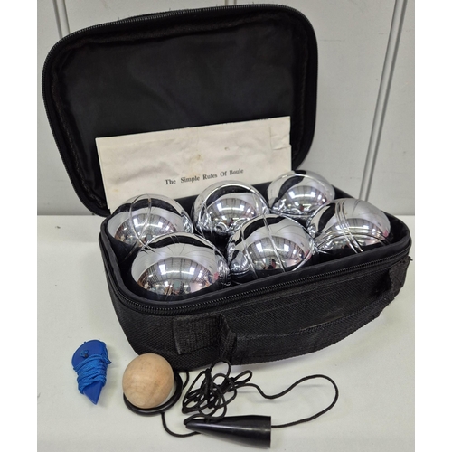 214 - A contemporary boules set with carry case.