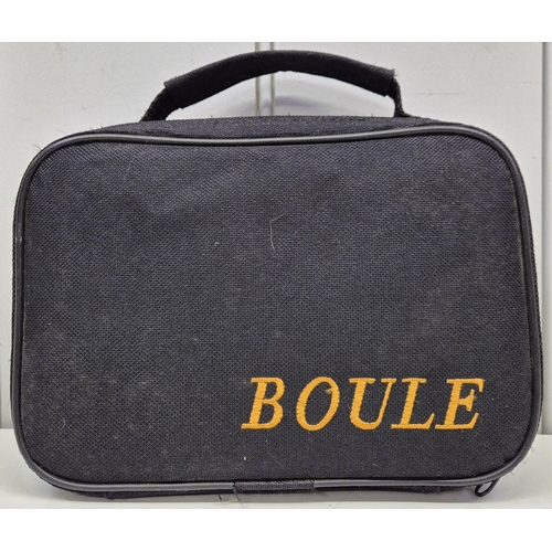 214 - A contemporary boules set with carry case.