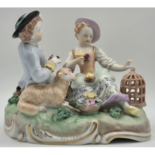 218 - An early 20th century Dresden figurine pair, relaxing with a lamb & bird. numbered 6993U. Dimensions... 