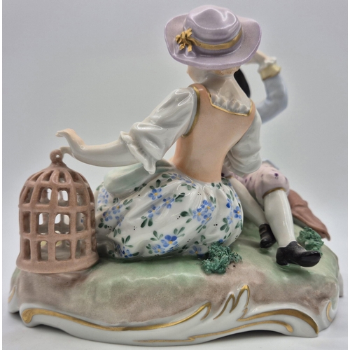 218 - An early 20th century Dresden figurine pair, relaxing with a lamb & bird. numbered 6993U. Dimensions... 