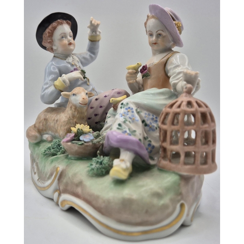 218 - An early 20th century Dresden figurine pair, relaxing with a lamb & bird. numbered 6993U. Dimensions... 