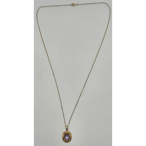 219 - A vintage gold-plated pendant & chain.