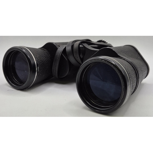 235 - A vintage pair of Hanimex 10x50 binoculars.