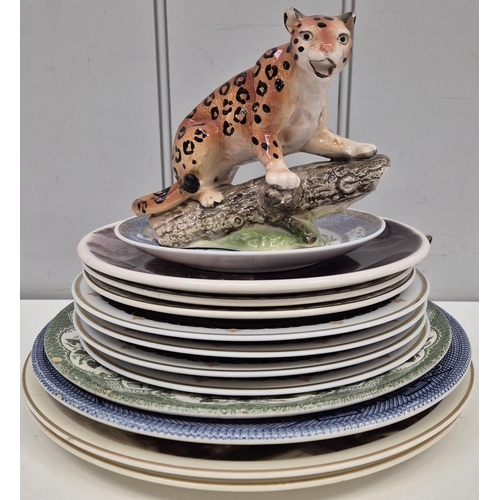 240 - A collection of twelve collector's plates, together with a Leopard figure. Makers include Fenton, Ch... 