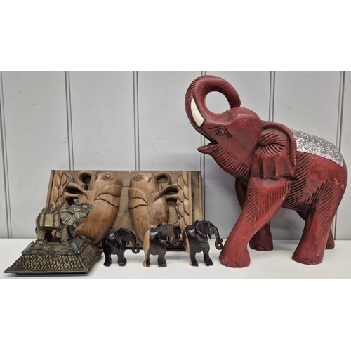 245 - A collection of six Elephant decorative pieces. To include a foldable/extendable bookshelf. Tallest ... 