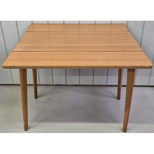 92 - A retro drop-leaf dining table. Dimensions(cm) H76, W45/80, D91.