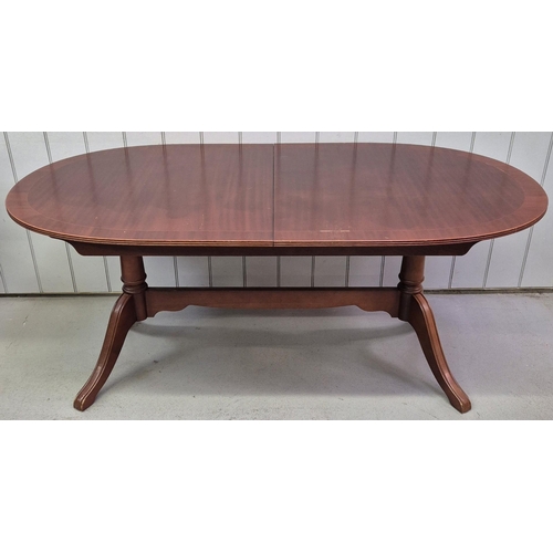 96 - A mid-century extending dining table by Stonehill Furniture, together with four dining chairs (two c... 