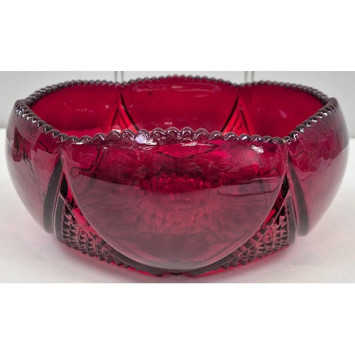 103 - A collection of mid-century glassware. To include a ruby red crystal bowl, three Italian red & gold-... 