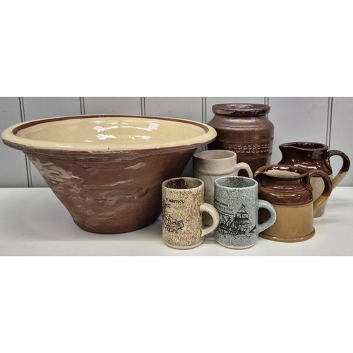 105 - A mixed lot of early 20th century stoneware, together with a Victorian Pancheon bowl.