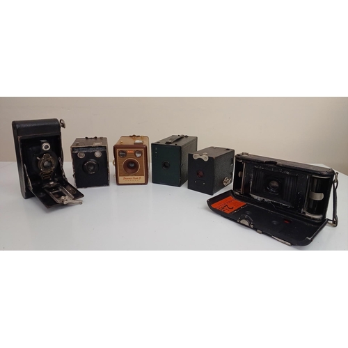 207 - A large collection of 13 vintage cameras, mostly with original cases. To include Brownie 120/127/Jun... 