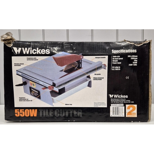 418 - A used Wickes 550W electric tile cutter, with original box.
PAT test pass & functionality test indic... 