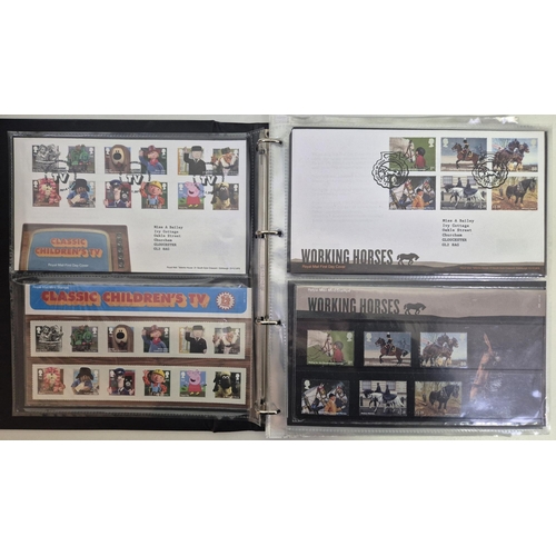 608 - A large collection of first day covers. A total of 10 albums full of first day covers, along with 25... 